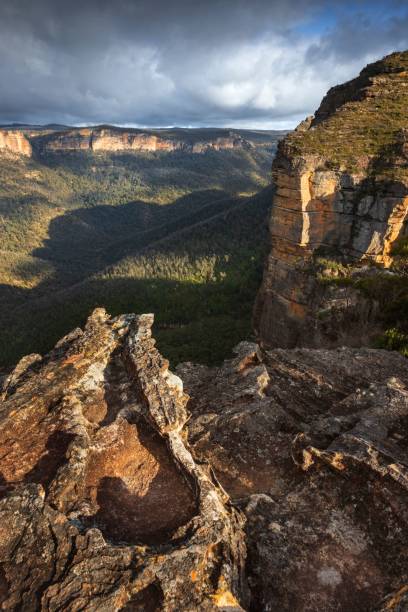 istock Rock formations in early light with views of valley in blue mountains 1445354679