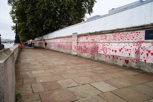 London, United Kingdom – October 07, 2021: A shot of the wall commemorating the British victims of the pandemic, with hearts for each victim