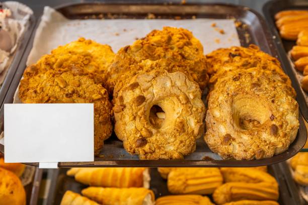 istock Nut rings, biscuits, lie on the counter in a delicious pastry store. 1445355516