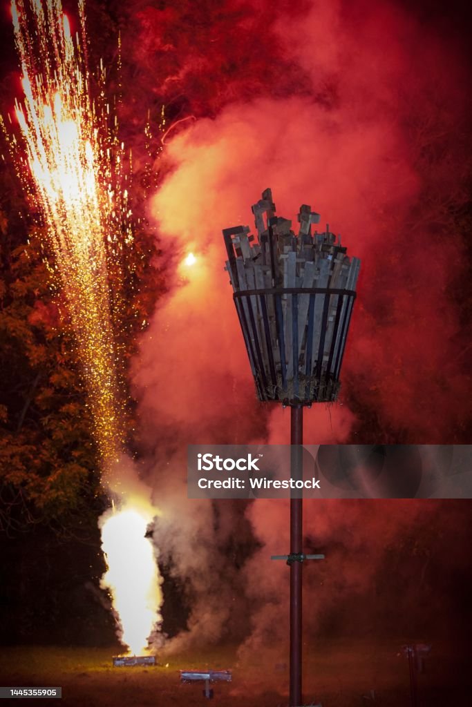 Fireworks let off behind the unlit beacon at Wendlebury, Oxfordshire for the Queens Diamond Jubilee The Fireworks let off behind the unlit beacon at Wendlebury, Oxfordshire for the Queens Diamond Jubilee Bicester Stock Photo