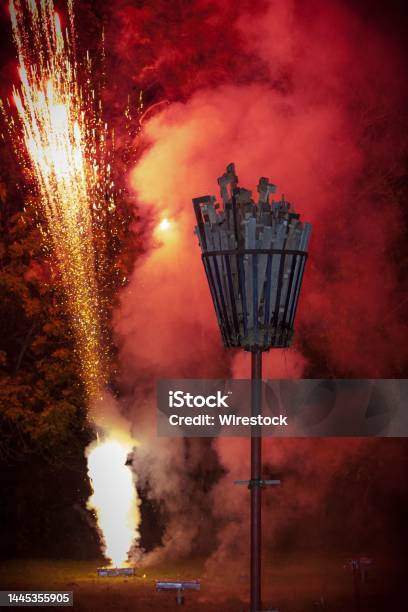 Fireworks Let Off Behind The Unlit Beacon At Wendlebury Oxfordshire For The Queens Diamond Jubilee Stock Photo - Download Image Now