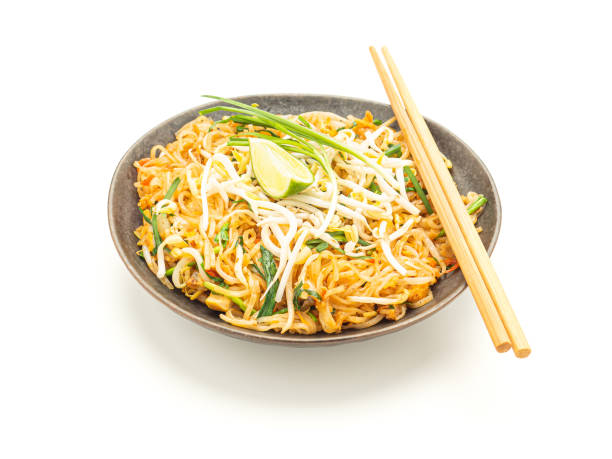 istock Pad Thai on a dish isolated on a white background 1445356653
