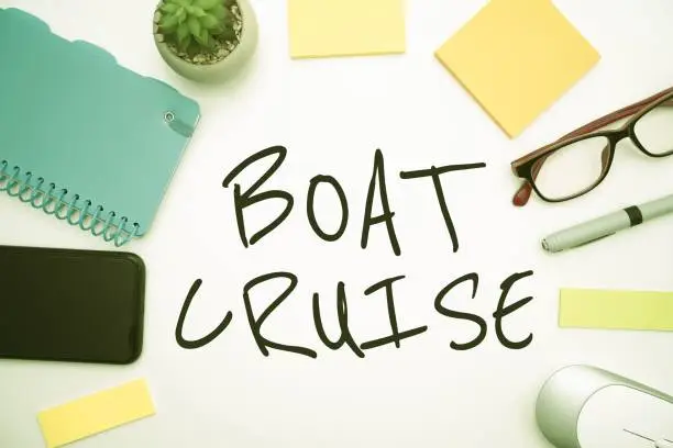 Photo of Closeup of flashy school office supplies with text caption presenting boat cruise