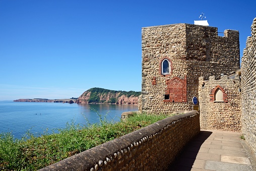 Drone view of the abandoned Hojerup Church at Stevns Klint in Denmark . The church dates back to 1250 but it was was abandoned in the early 20th century after the cliffs below started to fall into the sea, but it is maintained and it is now  a popular tourist attraction. A new church was built a couple of hundred meters away.