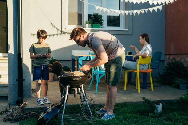 istock family barbecue in their home backyard 1445358474