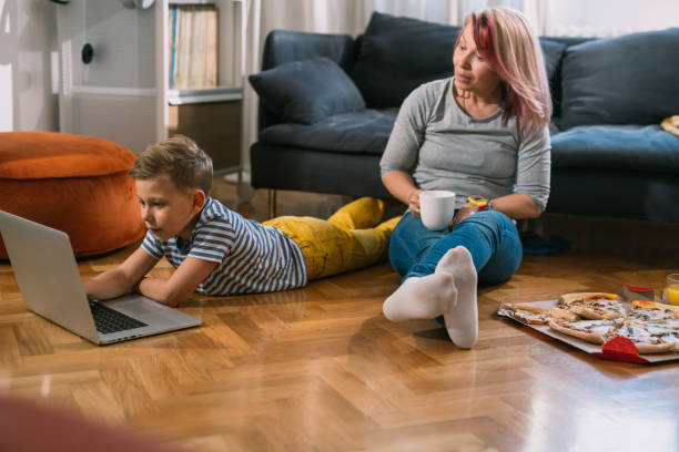 istock mother and son spending time at home 1445358743