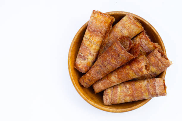 istock Sun dried banana roll snacks 1445359665