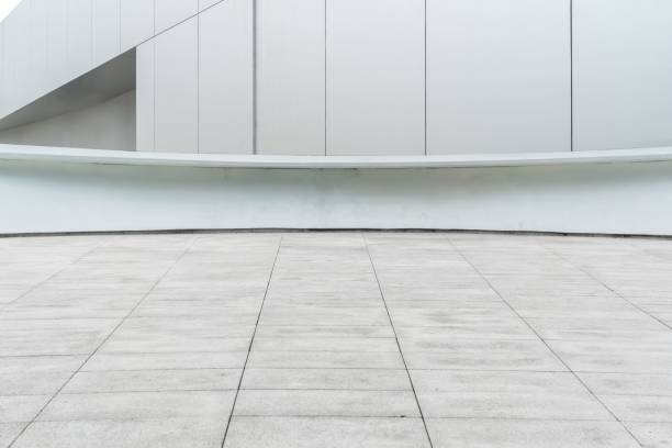 istock Empty ground floor in front of a modern architecture exterior. 1445360590
