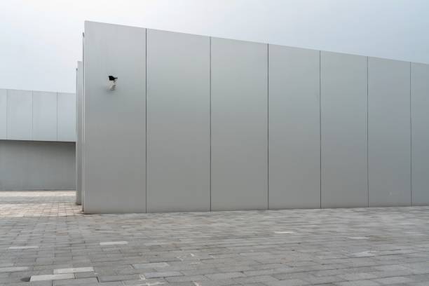 istock Empty ground floor in front of a modern architecture exterior. 1445361166