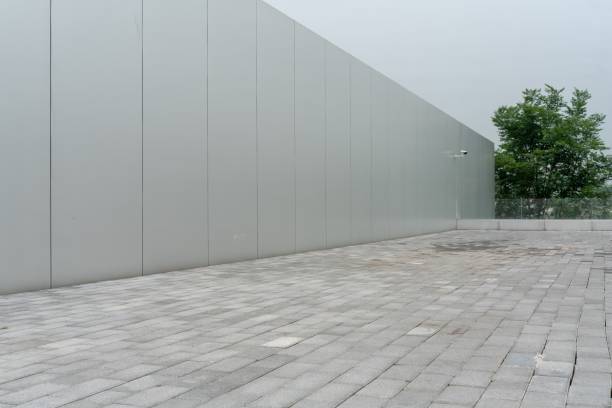 istock Empty ground floor in front of a modern architecture exterior. 1445361167