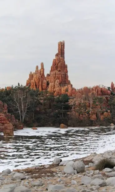 A vertical shot of a Frontierland theme park