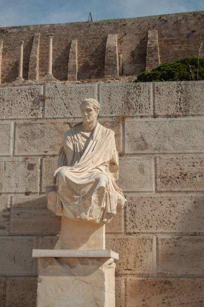 istock Ancient Greek statue at Acropolis on a sunny day 1445362468