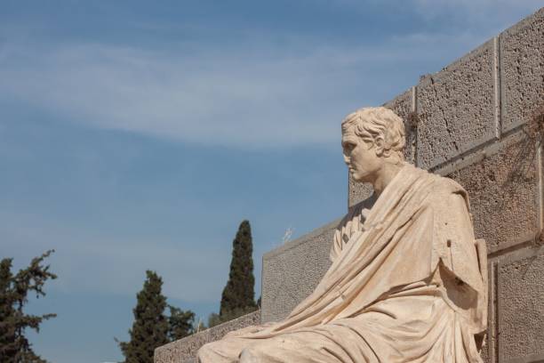 istock Ancient Greek statue at Acropolis on a sunny day 1445362496