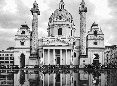 Vien, Austria – June 05, 2022: A grayscale shot of the baroque style Karlskirche church. South side of Karlsplatz in Vienna