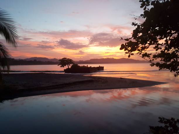 istock Beautiful sunset over a tropical beach. 1445364040