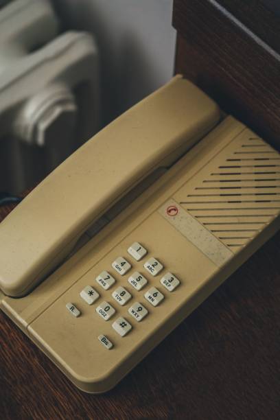 istock Old retro telephone with digital numbers, vertical shot 1445364168