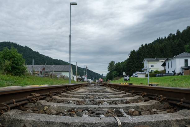 Low-angle shot of a railroad in the district of Grein in Austria A low-angle shot of a railroad in the district of Grein in Austria grein austria stock pictures, royalty-free photos & images