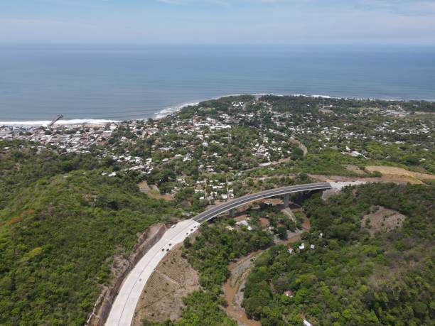 istock Drone view of a cityscape and a beach under blue sky 1445365272