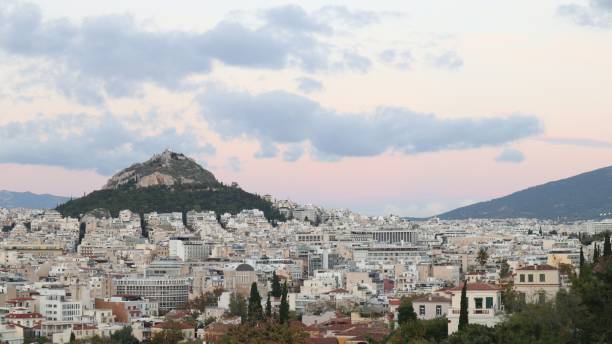istock Distant view of the Mount Lycabettus surrounded by buildings in Athens, Greece 1445366299