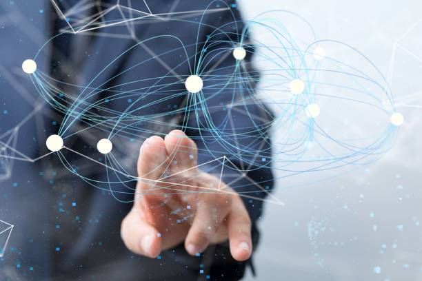 istock Man tapping with two fingers on an abstract hovering network in blue and white colors 1445369399