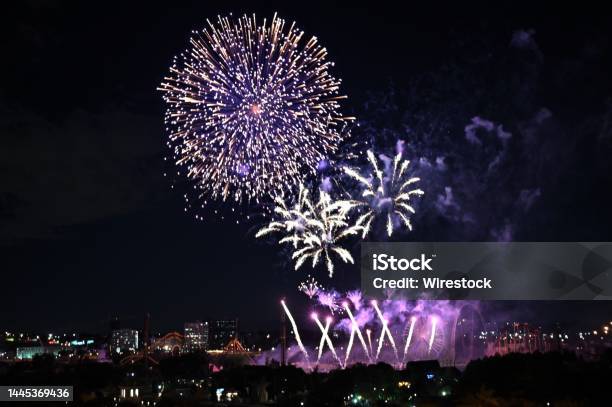 Beautiful View Of Purple Fireworks In The Night Sky Stock Photo - Download Image Now