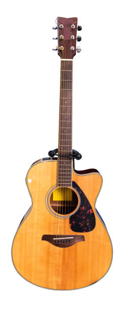 istock Wooden acoustic guitar isolated closeup horizontal (Clipping path) 1445373322