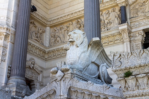 The details of the adorned facade of the Basilica of Notre Dame de Fourviere, Lyon, France