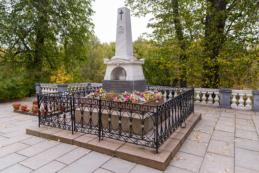 Pskov-Russia - 02.09.2020: Pushkin mountains. Pushkin's Grave. Obelisk on the grave of Alexander Pushkin