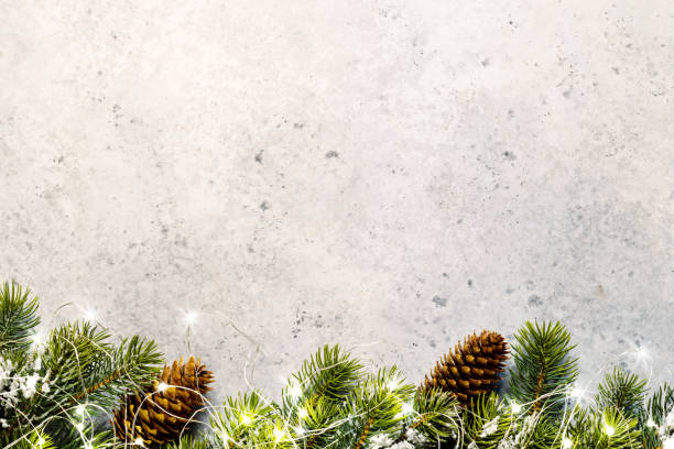 istock Christmas glowing garland and fir tree branches 1445379641