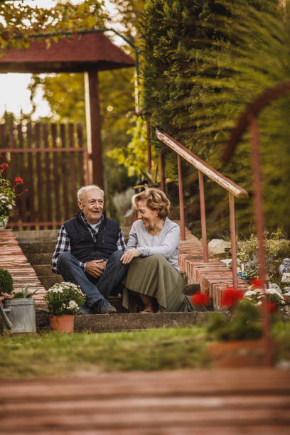 istock Affectionate senior couple having bonding moments, holding hands and smiling at each other 1445382466