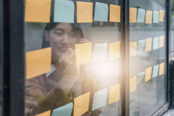istock Asian Business woman working at home office and analyze financial report document. Accounting and Finance concept 1445384607