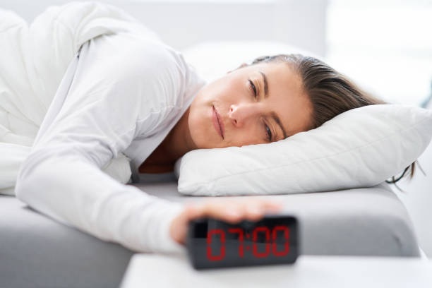 istock Young woman in the bed with sleep problems 1445384842