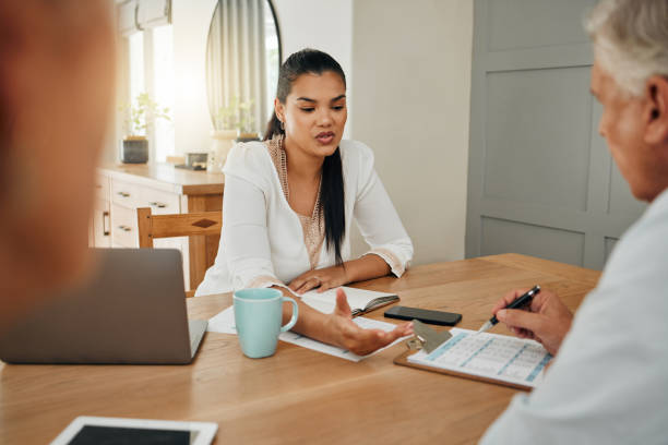 istock Insurance financial advisor woman, senior and contract sign debt application documents for home mortgage loan budget. Tax finance advice consultant girl consulting elderly couple on pension paperwork 1445384941