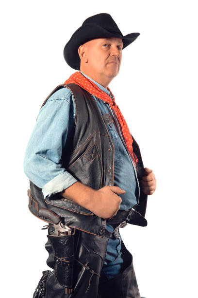istock Cowboy poses in front of a white background 1445385064