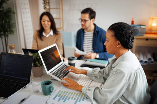 istock Colleagues working at the home office, exchanging ideas 1445386069