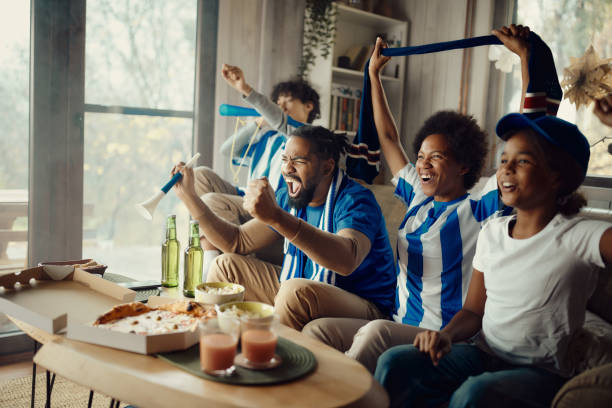 istock Yay, they've scored a goal! 1445387403