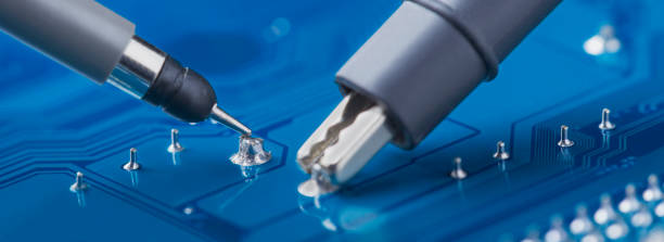 istock Measuring electronic signal using oscilloscope on the PCB. Electronics repair and digital technology. 1445388768