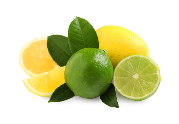 istock Fresh ripe lemons, limes and green leaves on white background 1445389093