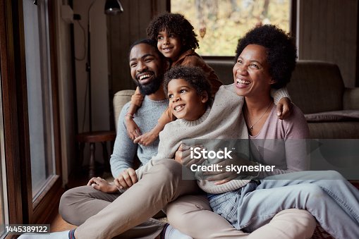 istock Happy black family enjoying in their time at home. 1445389122