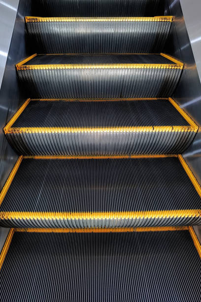 istock Close up of moving staircase 1445389732