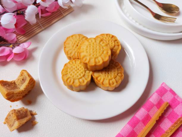 istock Mooncakes on white plate. It is traditional chinese bakery product. 1445390017