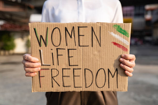 istock Woman protesting for women's rights in Iran 1445391933