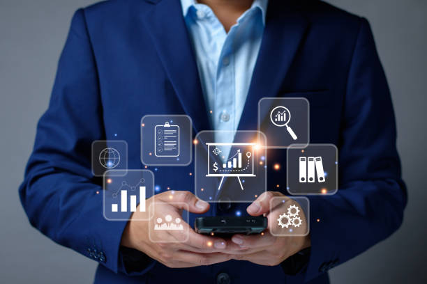 istock business management concept. development and management Executives looking virtual screens business management icons Goal setting, information, workflows, optimal business operations and innovation 1445392901