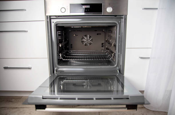 istock Modern electric oven with telescopic rails, top and bottom heat. Function 3D hot air, thermal grill and convection. Automatic cooking 1445392945