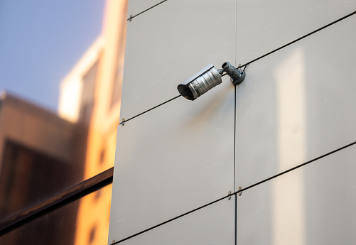Surveillance camera on the wall of the building.