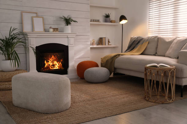 istock Stylish comfortable poufs near sofa in room. Home design 1445395148