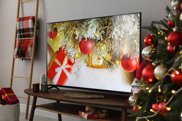 istock Modern TV and Christmas decor in room 1445395213
