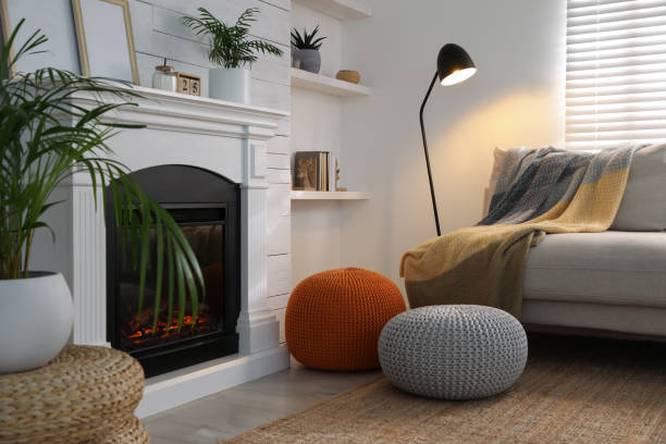 istock Stylish comfortable poufs near sofa in room. Home design 1445395943