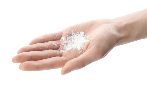 istock Woman with dusting powder on white background, closeup 1445397073