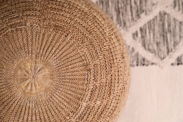 istock Stylish comfortable pouf on floor, top view. Home design 1445397350